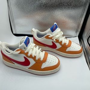 Nike orange, white, orange and red size 3.5 sneakers